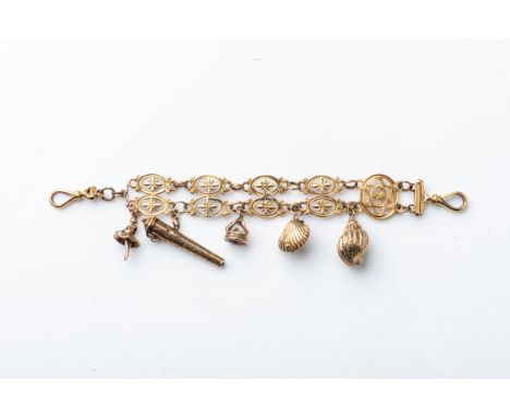 A GOLD CHARM BRACELET  An open panel work design, with 5 charms, in 9ct yellow gold, 15cm in length 