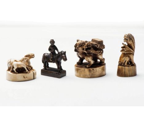 A COLLECTION OF CHINESE SEALS Comprising: A recumbent horse and her filly on an oval base carved with script to the underside