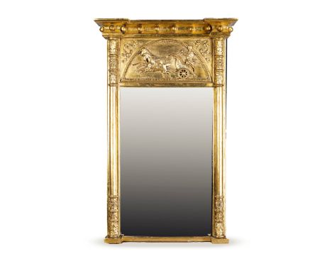 A REGENCY GILTWOOD WALL MIRROR, CIRCA 1820  The rectangular cornice set with gilt balls above a carved panel of a horse-drawn