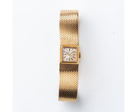 A LADY'S GOLD IWC WRISTWATCH  The 10mm square dial with baton markers, the gold mesh strap with fold over clasp, circa 1960 