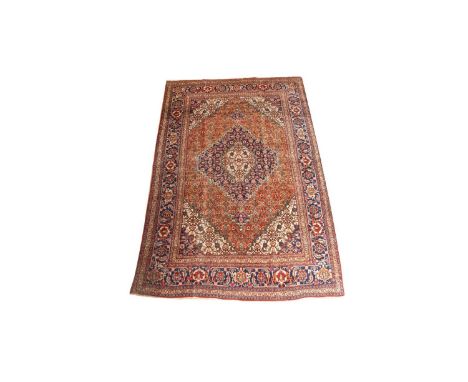 A Brojerd carpet, with diamond-shaped floral medallion and flower head design to field, 308 x 204cms. 