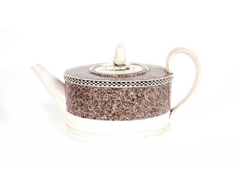 A 'Mochaware' teapot, circa 1800, the cover with acorn finial, with an engine-turned pearlware body, decorated with a band of