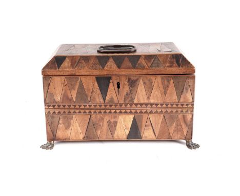 A William IV specimen wood parquetry tea caddy, of rectangular form, with triangular inlay comprised of numerous timbers, wit