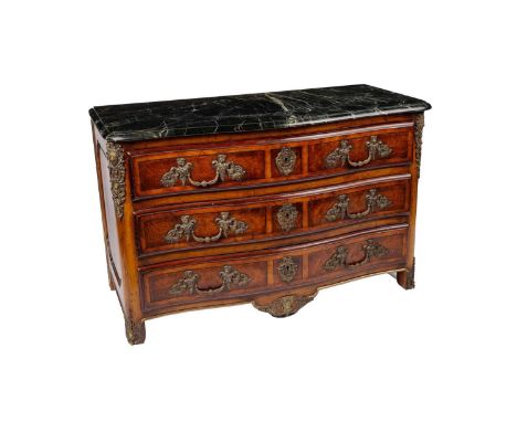 A French Louis XV revival serpentine commode, the black marble top with moulded edge, over three long drawers with ornate fig