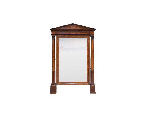 A large and impressive 19th Century French mahogany cheval mirror, of architectural form, the rectangular plate within ogee m