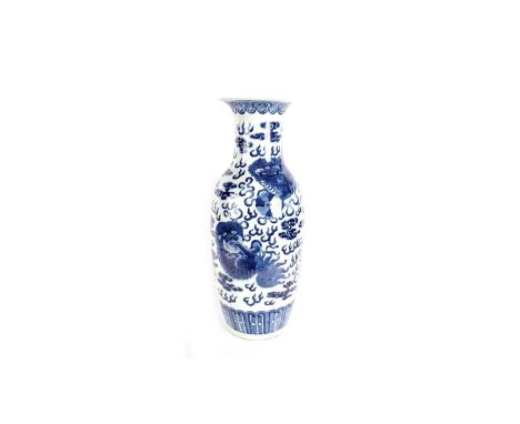 A late 19th century Chinese blue and white vase, decorated with Buddhist lions and cloud scroll within ruyi head and stiff le