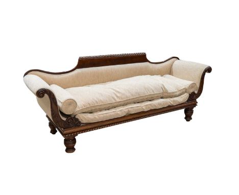 An early Victorian carved mahogany scroll end sofa, with gadrooned detail to the top rail and apron, acanthus carved ends, ra