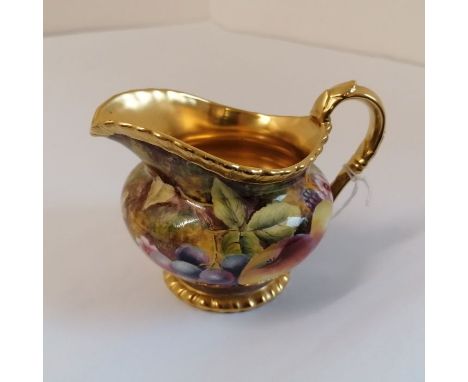 A Royal Worcester hand painted with fruit jug signed by B Cox (Brian Cox). Black mark.Approximate height 10cmIn good conditio