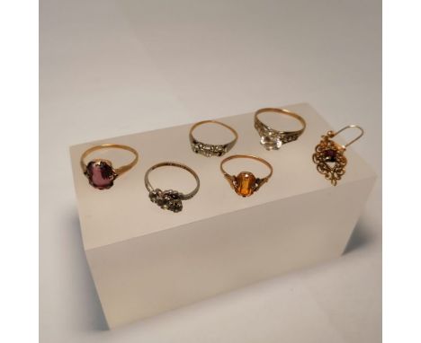 A collection of 9ct gold and "9ct" stamped yellow metal jewellery. Comprising a 9ct gold Cubic Zirconia ring, size R, another