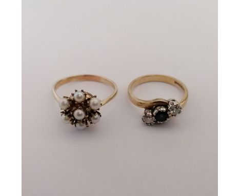 Two dress rings. Comprising a sapphire and diamond trilogy ring, in 9ct yellow gold, marked for Birmingham, size O, approxima