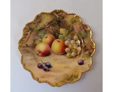 A Royal Worcester hand painted with fruit plate. Signatures include T Lockyer. Puce mark. Approximately 22 cm.In good conditi
