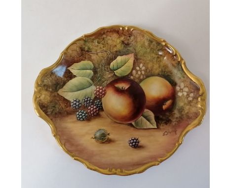 A hand painted serving plate signed by J Skerritt (James Skerrit, a Royal Worcester artist).Approximately 26 cm x 23 cmIn goo