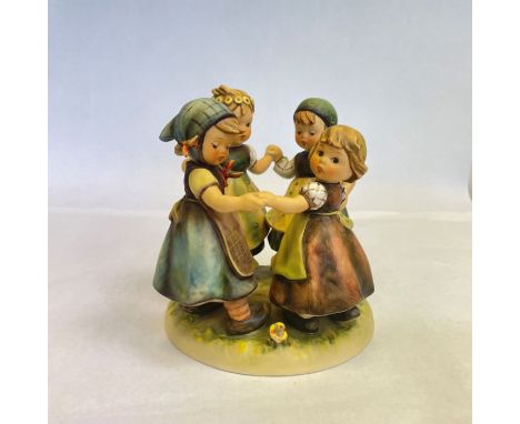 A large Goebel Hummel figure "Ring around the Rosie" approximately 18 cm highNo visible cracks or chips
