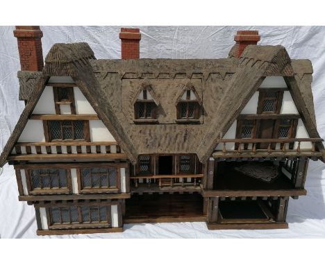 A vintage sturdy scratch built model dolls house of substantial proportions. Built by the vendors father, a house builder and