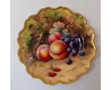 A Royal Worcester hand painted with fruit plate. Signatures include T Lockyer. Puce mark. Approximately 22 cm.In good conditi