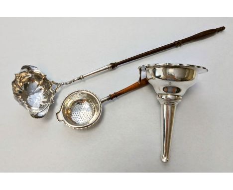 A silver claret funnel/decanter engraved "RW" (Approximately 128g), a tea strainer and a toddy ladle