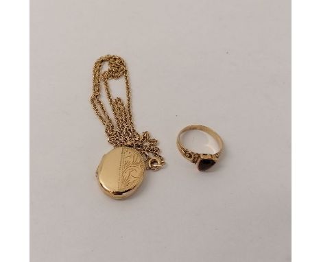 A 9ct gold locket and 375 stamped chain. Gross weight approximately 5.6 grams. Along with a yellow metal carved ring, set wit