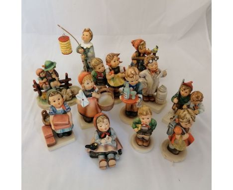 A collection of twelve Goebel Hummel figurines to include "Parade of Light", "Little Pharmacist" and "The Builder"  Tallest: 