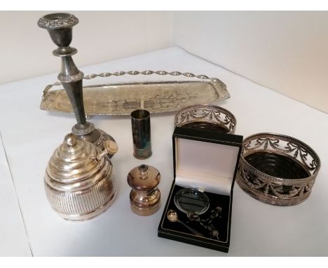 A mixed lot of plated items to include:Wine coasters, honey pot, candlestick, shot measure, pepper grinder and cherub salt