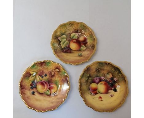 A collection of three Royal Worcester hand painted with fruit plates. Signed by P Platt (Peter Platt), James Skerrett and T N