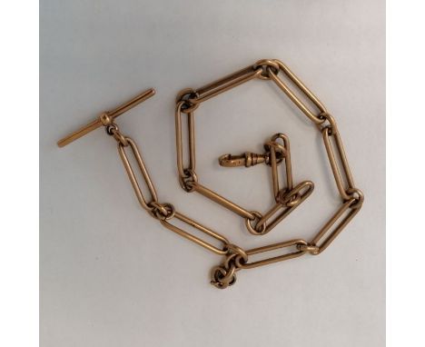 A 9ct rose gold watch chain with paperclip and round links. Featuring a T bar and a fob clip. Hallmarked for Birmingham. Leng