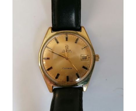 A vintage 1970s automatic Omega Geneve Gentlemen's dress watch.Gilded 35mm steel case, with gilded dial, black baton interval