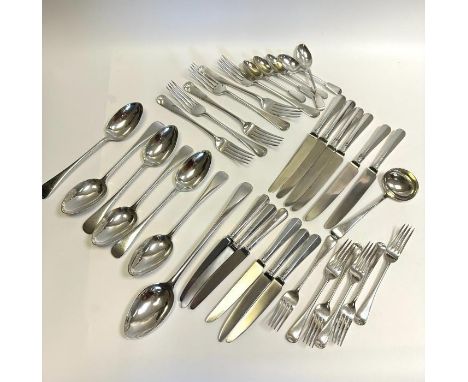 A collection of silver flatware and a silver basting spoon. Approximately 1450 grams of weighable silver