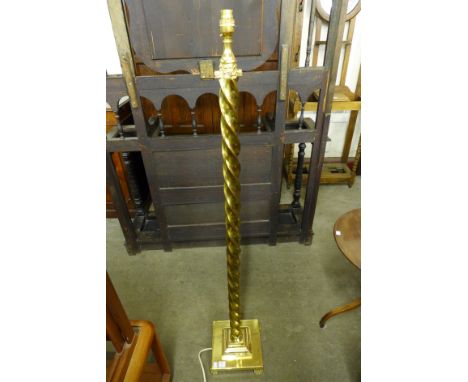 A brass barleytwist standard lamp