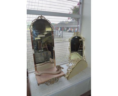 Two rococo style console tables and mirrors