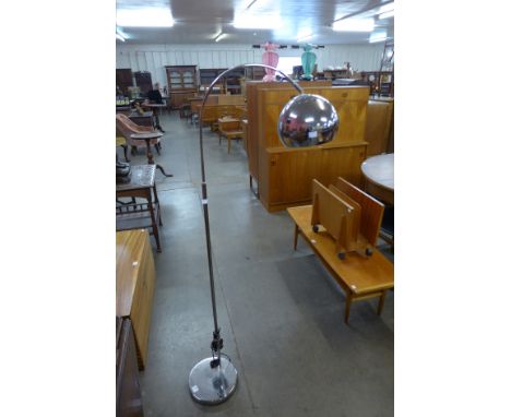 A chrome standard lamp