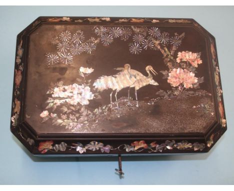 Oriental lacquered jewellery box, decorated with inlaid mother of pearl