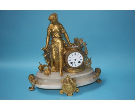 A late 19th century gilt metal mantel clock by P. H. Mourey, with 8 day movement, strike action, numbered 1066, supported on 