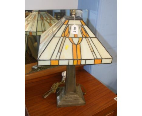 A table lamp, with Tiffany glass style shade