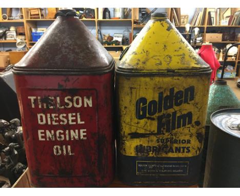 Two vintage oil cans