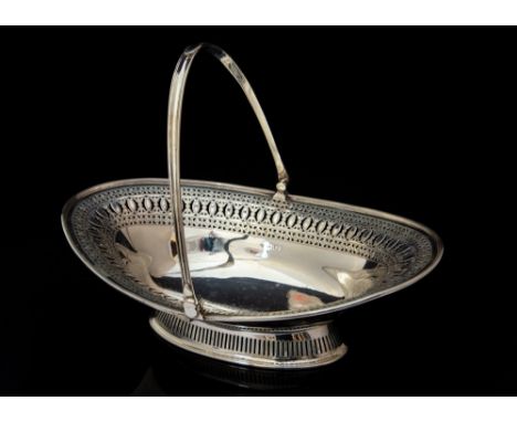 A Victorian silver bright-cut engraved oval bread basket in the Neo-Classical manner, reeded rim border gallery pierced and e