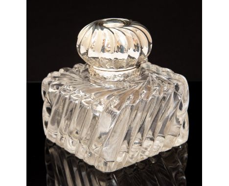 A large George V silver mounted inkwell, with spiral moulded glass, plain silver collar with wyvern fluted domed cover, J Gor