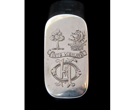 A late Victorian silver large "go-to-bed" vesta case, cushion shaped with pinch button release cover, the cover engraved with