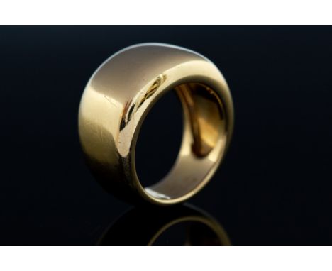 Cartier, a 18ct yellow gold band ring, stamped no. J20107 and 55, the plain polished band approx 13.5mm taking to 7.8mm, ring