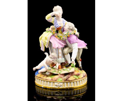 A Meissen figure group of a courting couple and two cherubs titled The Broken Bridge, late 19th Century, blue crossed batons,