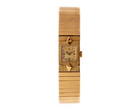 Longines, a mid 20th Century lady's 9ct gold Longines cocktail wristwatch, 1.5cm square champagne dial, integral textured str