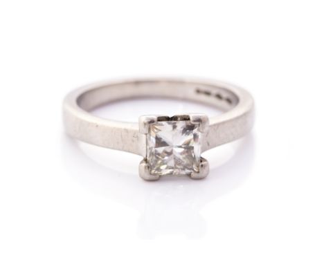 A diamond solitaire, the princess cut diamond weighing approx 0.98carat, assessed colour K, assessed clarity VS, claw set pla