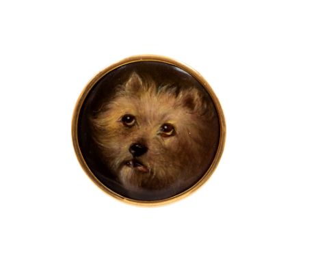 A small mid-Victorian circular miniature Essex Crystal portrait brooch, depicting a Terrier, stamped to reverse 'Essex 1861',