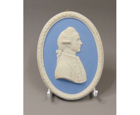 A Wedgwood oval blue and white jasper portrait plaque of Captain Cook, mid 20th Century, marked WEDGWOOD, Made in England, 57