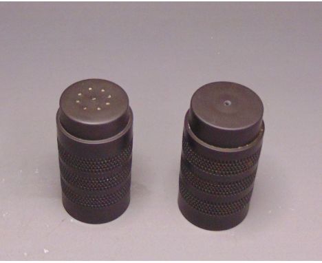 A pair of Wedgwood black basalt engine turned salt and pepper pots, 20th Century, from the Design for Today Range marked WEDG