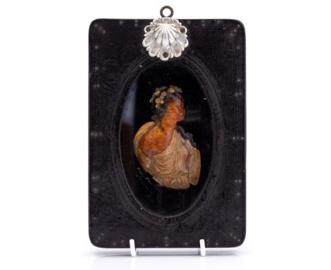 A 19th Century cast wax portrait profile of Lady Hamilton, coloured, in a sealed and glazed frame, 18cm by 13cm