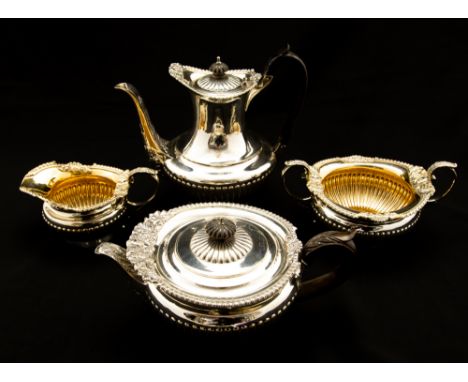 A Victorian matched four piece tea and coffee service comprising coffee pot, tea pot, sugar bowl and milk jug, the bodies wit