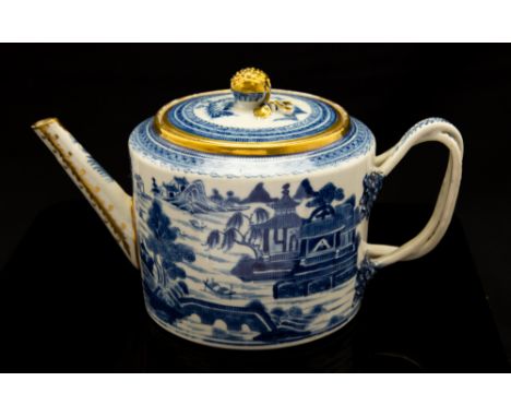 An 18th Century Chinese export blue and white teapot, circa 1770, decorated with a river landscape scene with pagodas, double