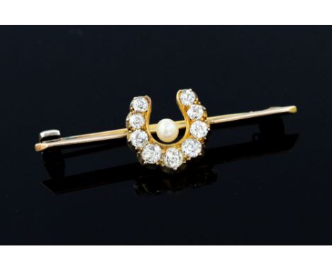A diamond and seed pearl yellow gold bar brooch, the central   horseshoe set with a total of nine old-cut diamonds and a pear