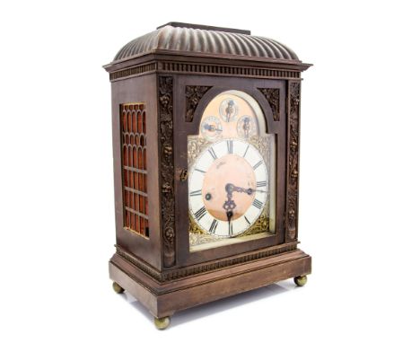 A late 19th Century mahogany bracket clock, circa 1890, gadrooned caddy top, arched brass dial with speed, chime/silent and c