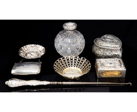 A collection of late 19th and early 20th Century silver including: heart shaped trinket/ring box, profusely chase, gilt inter